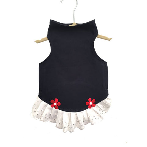 430 Daisy & Lucy Navy Jersey Top with Eyelet Trim and Flower Detail